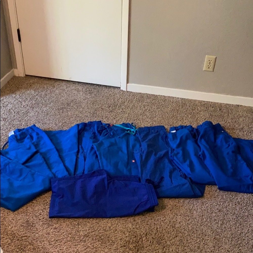 Eight pairs of Royal Blue Scrub Bottoms Pants
